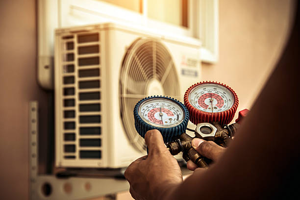 Professional Ac Installation technician working in Hartville, OH